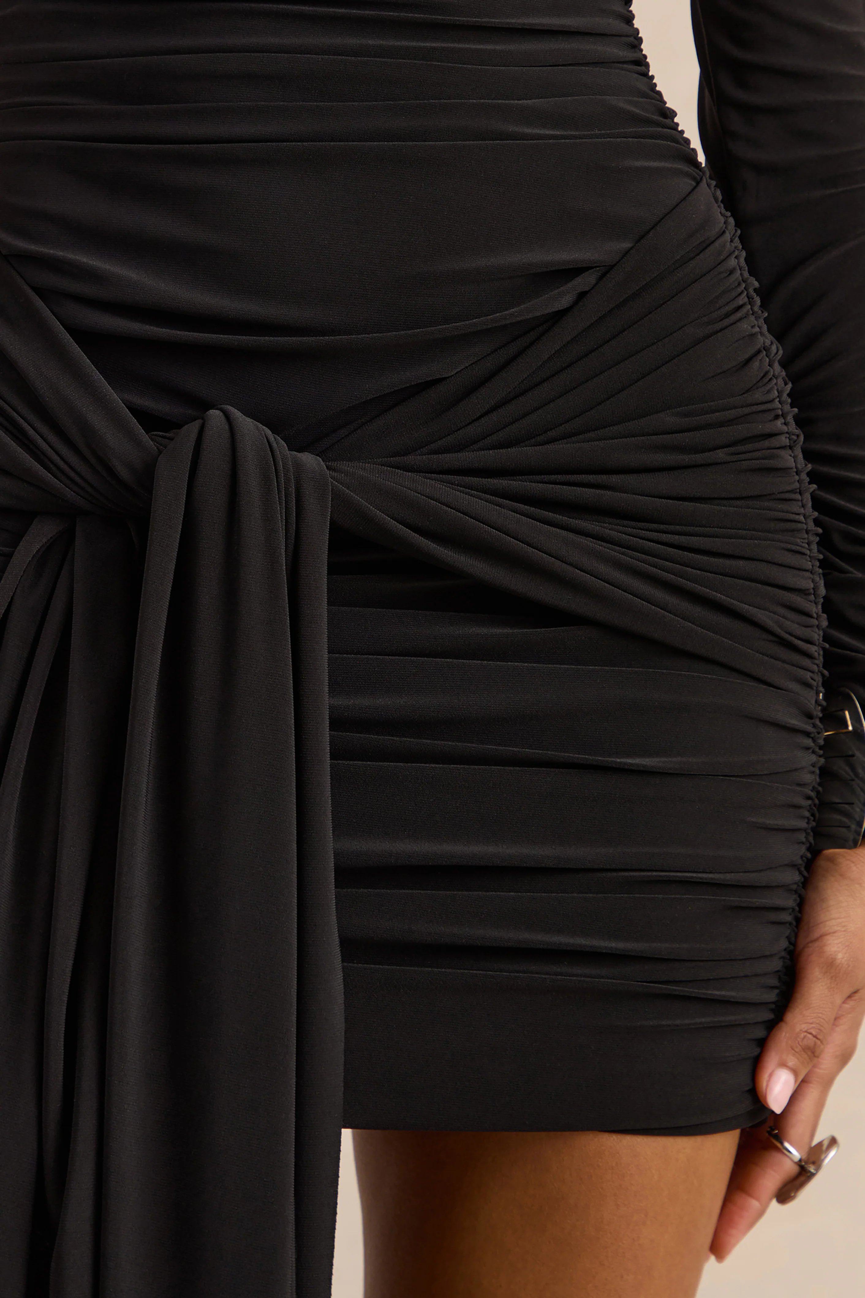 Irissia | Black Asymmetric-Neck Mini Dress With Knot And Sash Detail - Image 6
