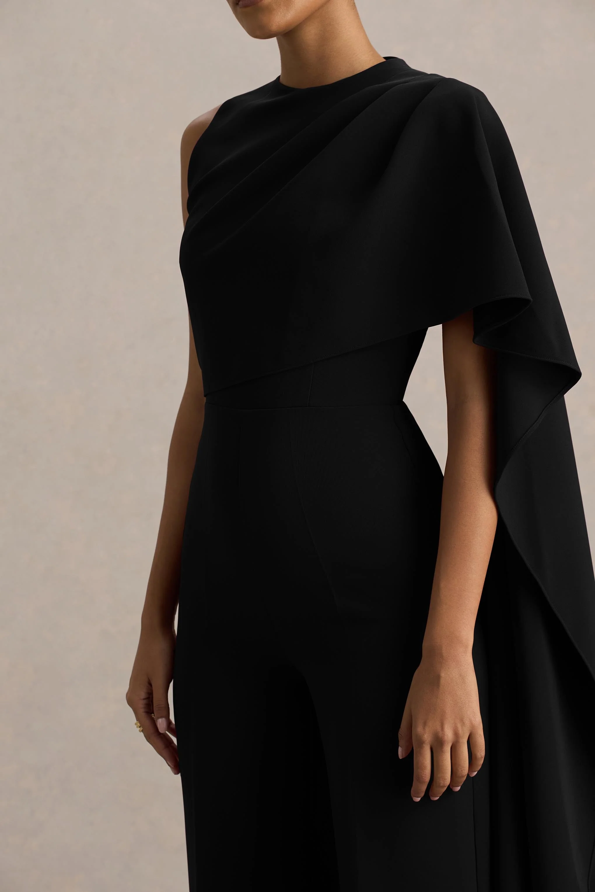 Sorenia | Black High-Neck Jumpsuit With One-Cape Sleeve - Image 3