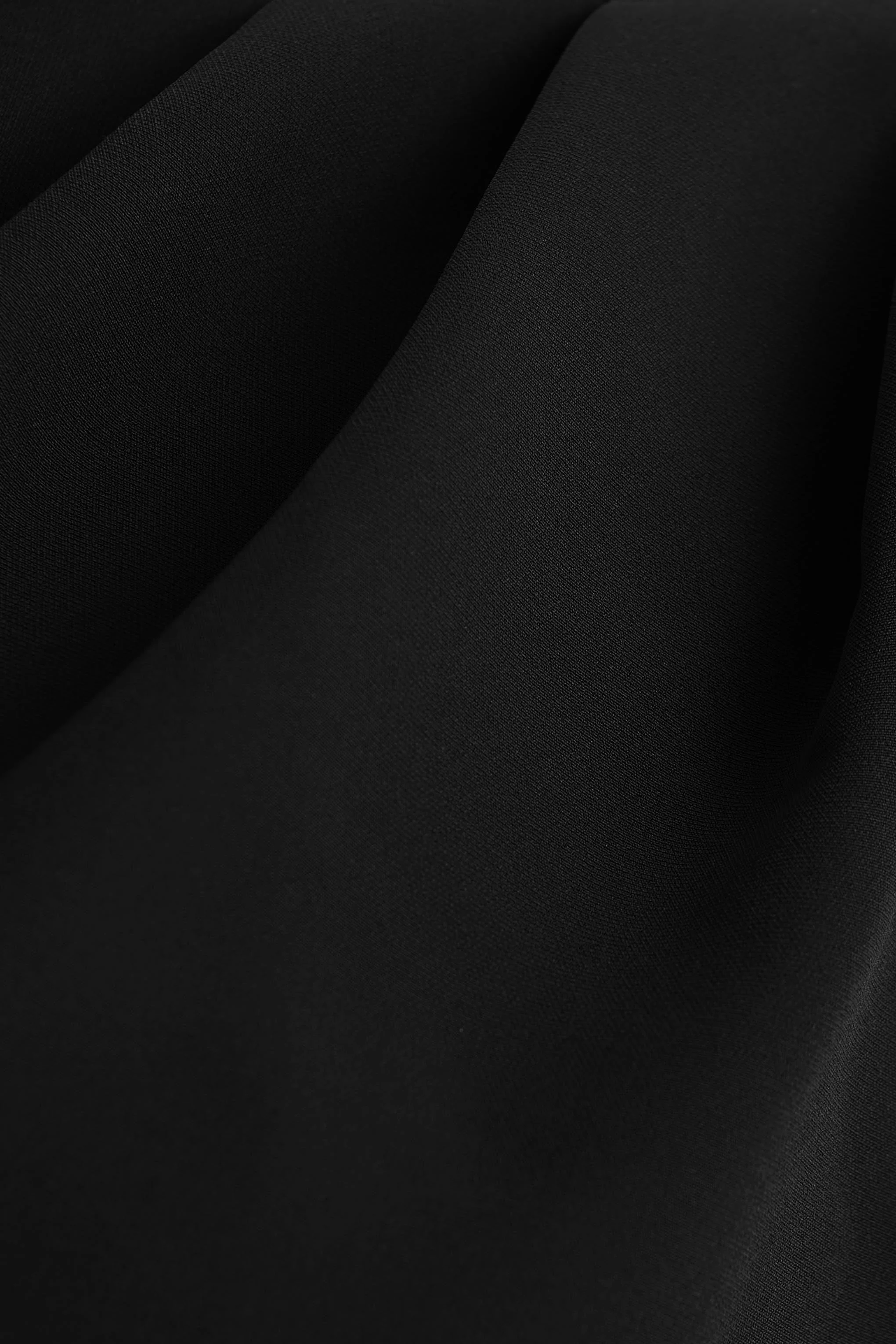 Sorenia | Black High-Neck Jumpsuit With One-Cape Sleeve - Image 8